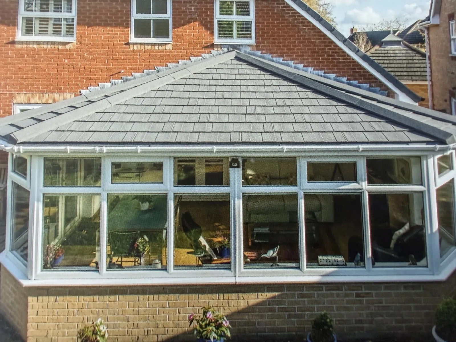 A traditional roof appearance on the existing frames.